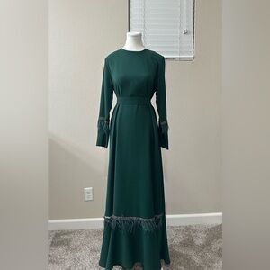 Elegant Emerald Green Long Sleeve Dress with rhinestones and feathers!